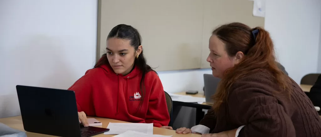 female-student-receiving-support